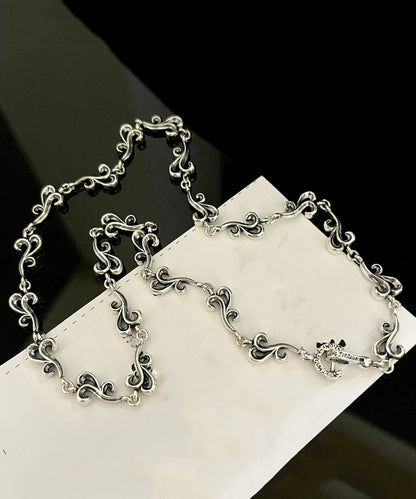 Collier unique en argent sterling avec nuages ​​de bon augure ajourés en soie KX1047