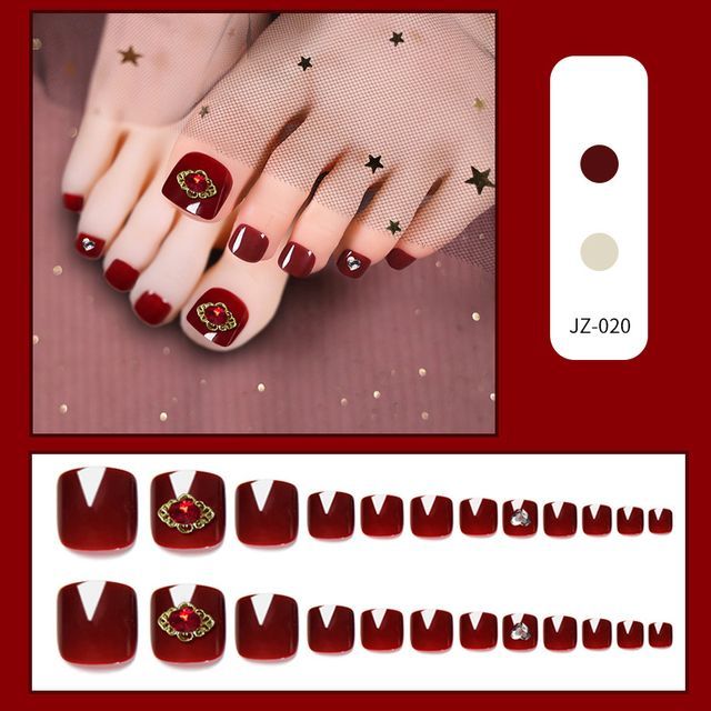 Zehennagelspitzen mit Strasssteinen