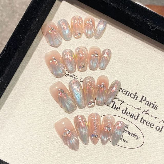 Ongles à pression œil de chat (différents modèles)