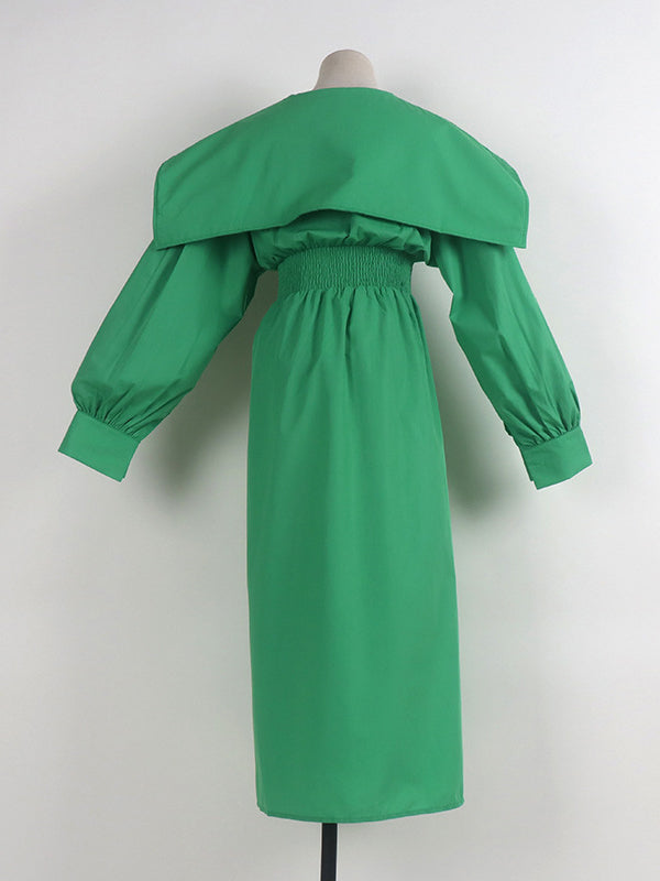 Robe longue noire plissée asymétrique à revers et ceinture moderne 