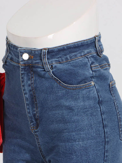 Jean droit rouge chic noué taille haute boutonné 