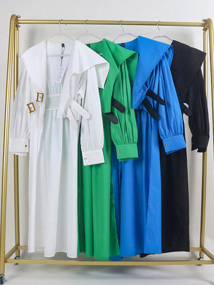 Robe longue noire plissée asymétrique à revers et ceinture moderne 