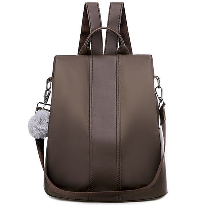 Purse Damen-Rucksack aus Kunstleder mit Bommel