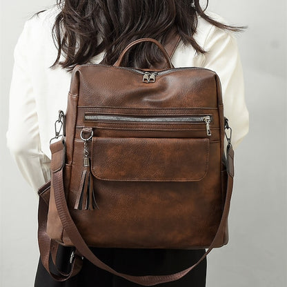 et sac à dos vintage en cuir avec pompon et similicuir pour femme