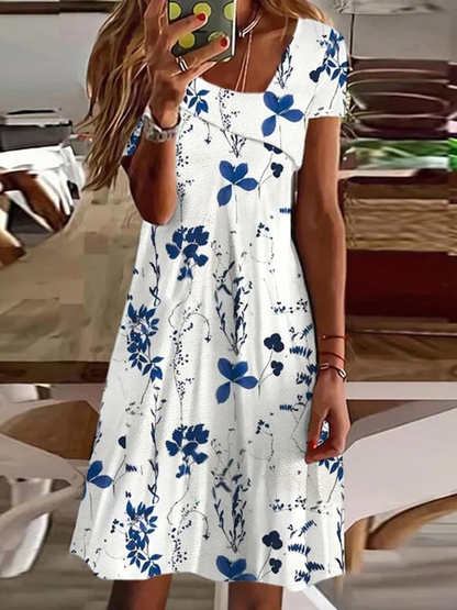 Robe décontractée asymétrique ample à fleurs WL112